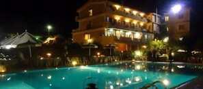 Seasonal outdoor pool, pool umbrellas, pool loungers