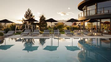 Indoor pool, pool umbrellas, pool loungers