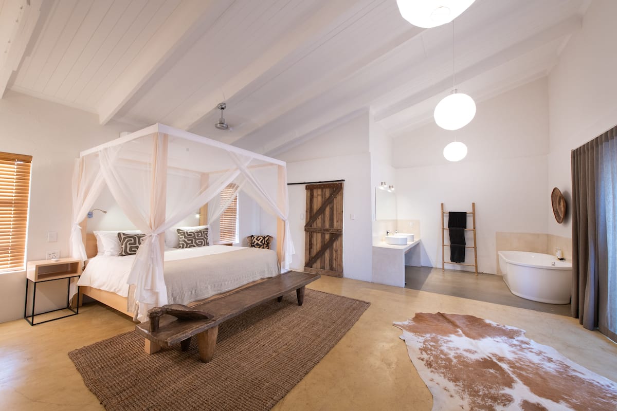 Villa Mbali - Garden Suite | 1 slaapkamer, luxe beddengoed, een minibar, een kluis op de kamer