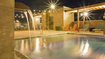 Seasonal outdoor pool, open 7:00 AM to 11:00 PM, pool loungers