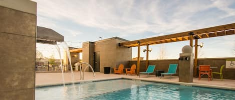 Seasonal outdoor pool, open 7:00 AM to 11:00 PM, sun loungers