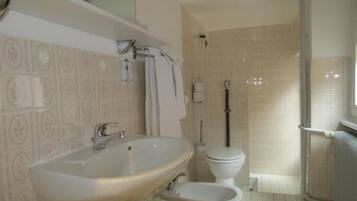 Shower, free toiletries, hair dryer, towels