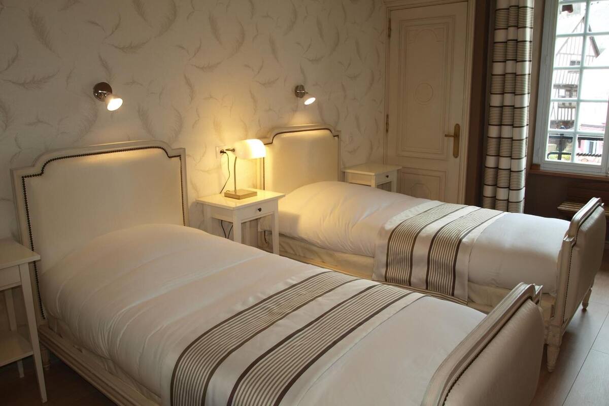 premium bedding, desk, blackout curtains, soundproofing