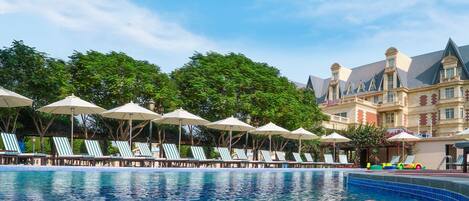 Indoor pool, outdoor pool, open 7:00 AM to 7:00 PM, sun loungers