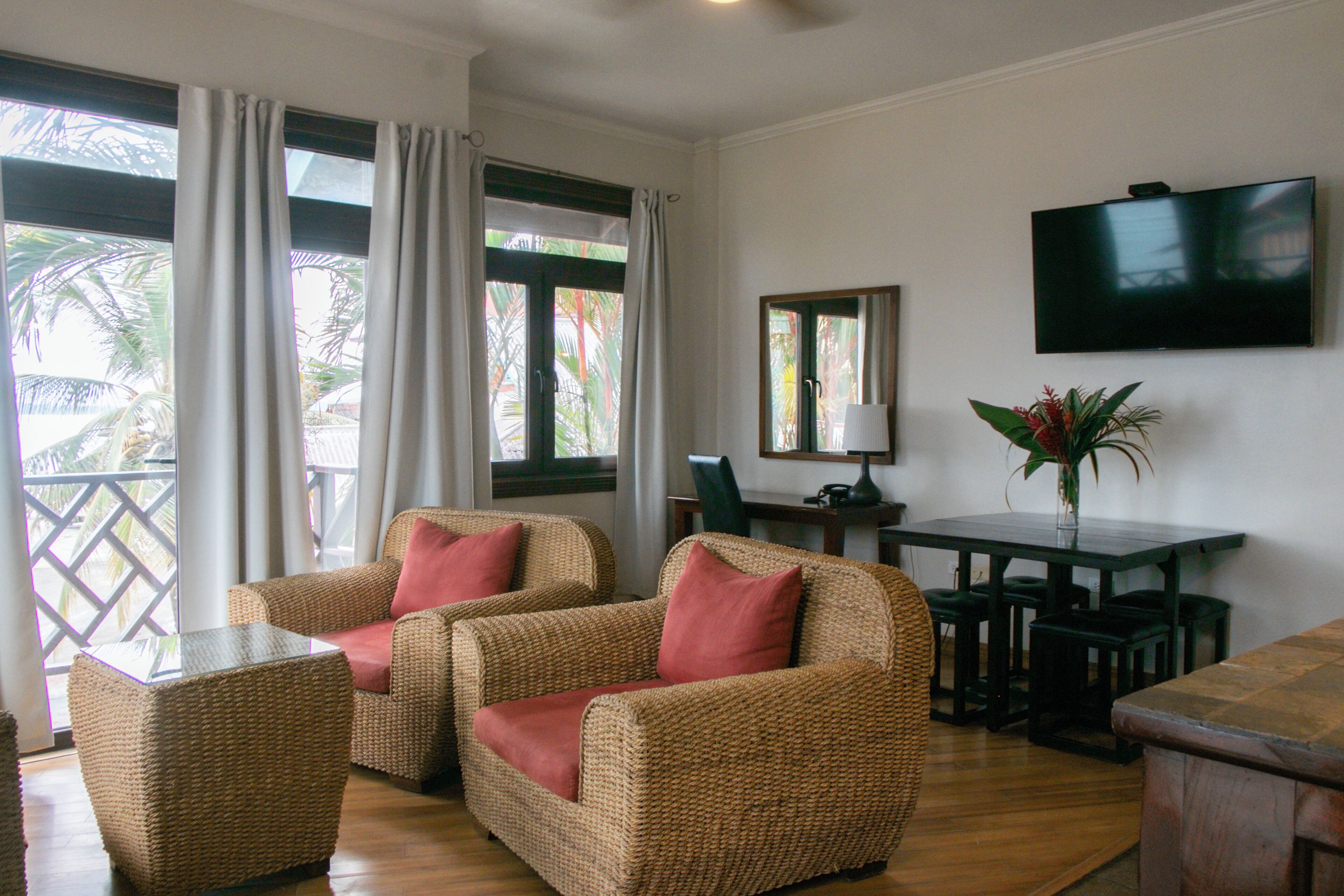 luxury suite, 1 bedroom, sea view | living area | 32-inch lcd tv with cable channels, tv