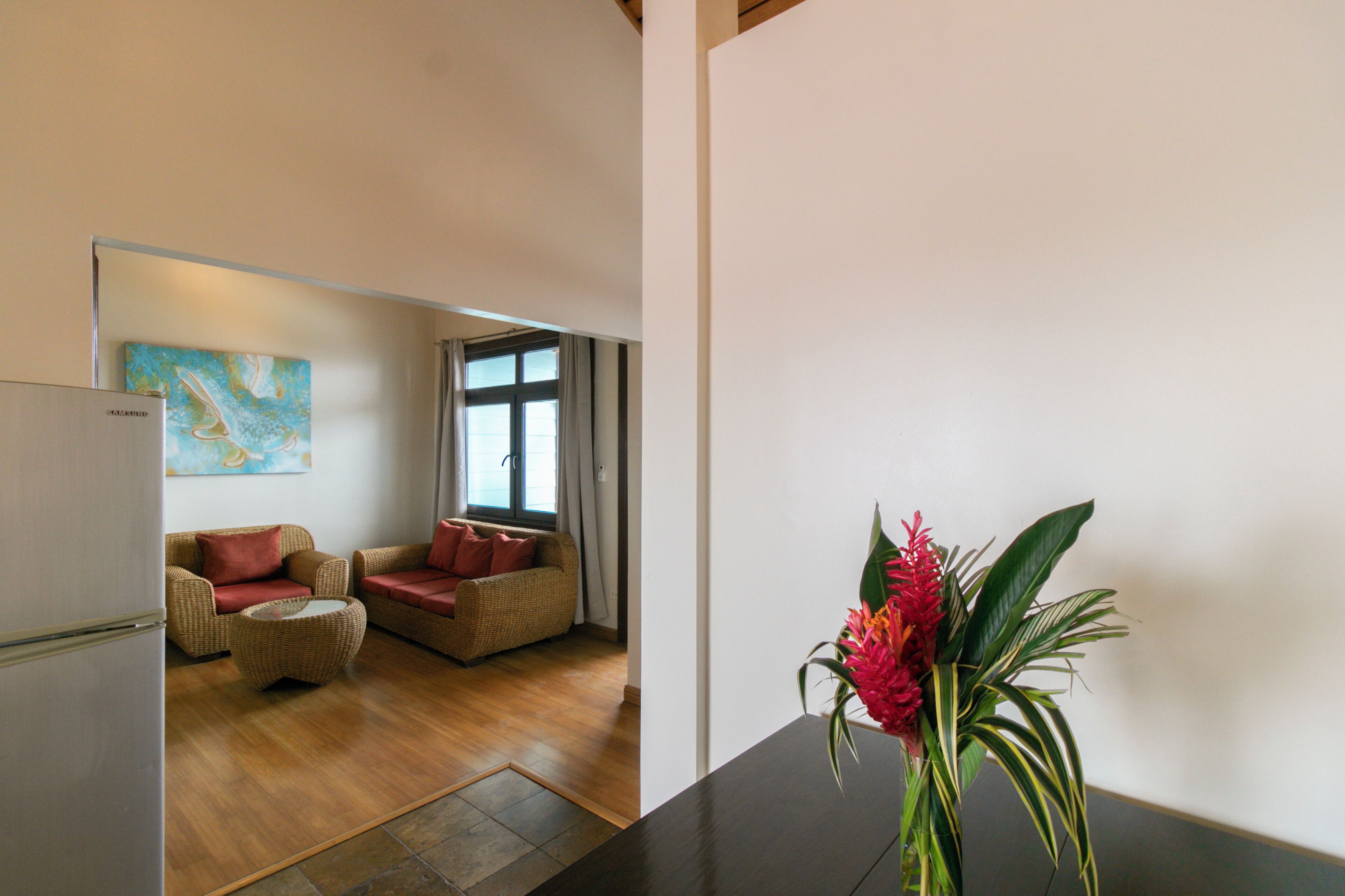 luxury suite, 1 king bed, sea view | living area | 32-inch lcd tv with cable channels, tv