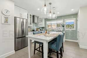 Townhome, 2 Bedrooms | Private kitchen | Full-size fridge, microwave, oven, stovetop - Oceanside Townhouse with Ocean View and Access to the Deck by RedAwning (Fernandina Beach)