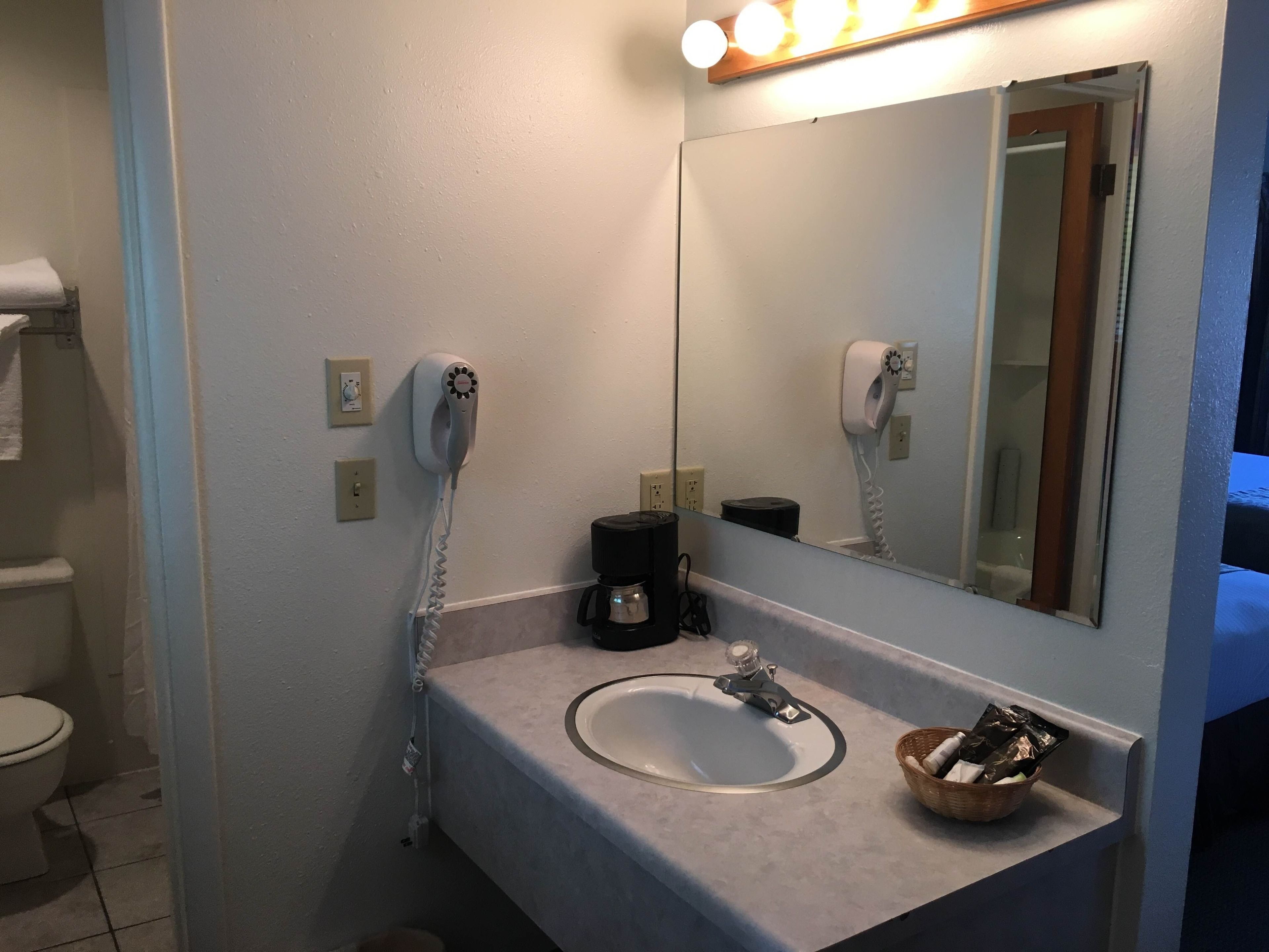 Combined shower/bathtub, hair dryer, towels, soap