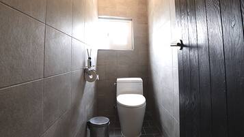 Shower, free toiletries, hair dryer, slippers