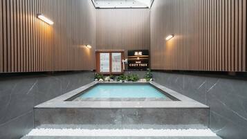 Ryokan (Japanese style room) | Bathroom | Combined shower/tub, free toiletries, hair dryer, bathrobes