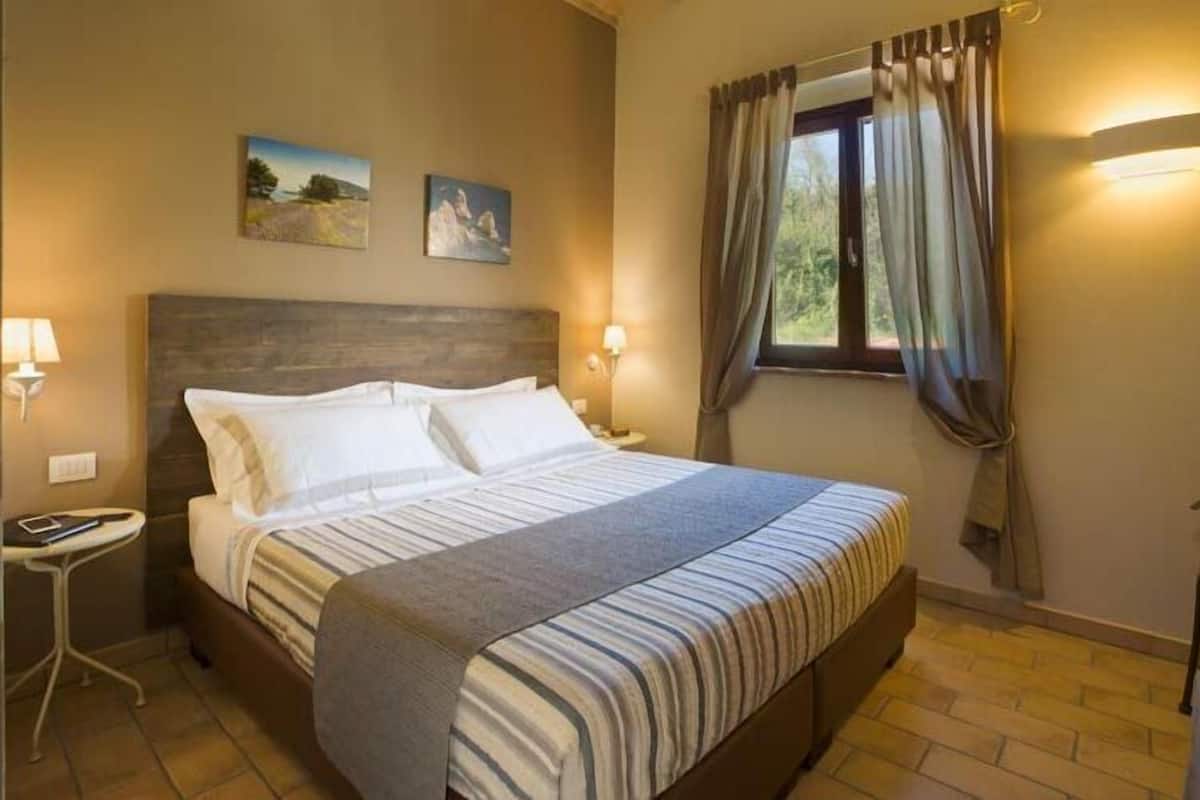 Superior kamer, 1 twee- of 2 eenpersoonsbedden | Donzen dekbedden, bedden met traagschuimmatras, een kluis op de kamer
