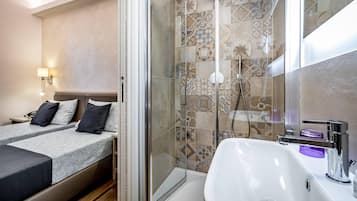 Premium bedding, down comforters, minibar, desk