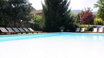 Outdoor pool, sun loungers