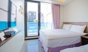 A hotel room with a bed, a desk, a TV, and a window with a view of buildings. - Hotel 99 (Taichung)