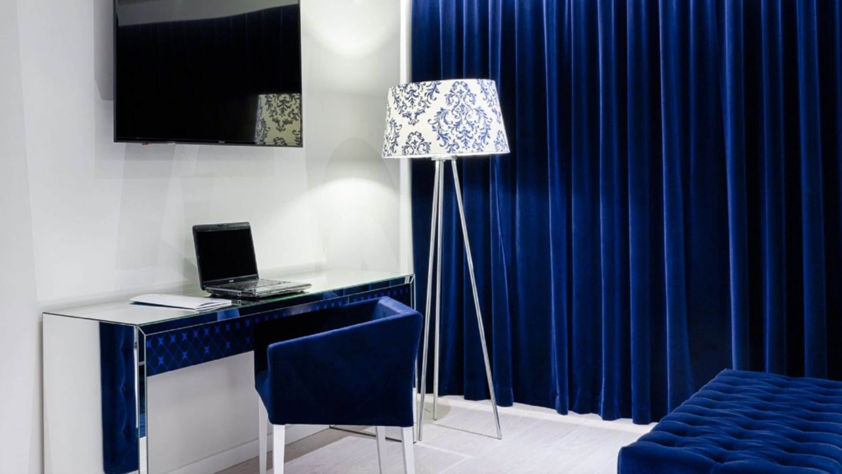 triple room | in-room safe, desk, laptop workspace, blackout curtains