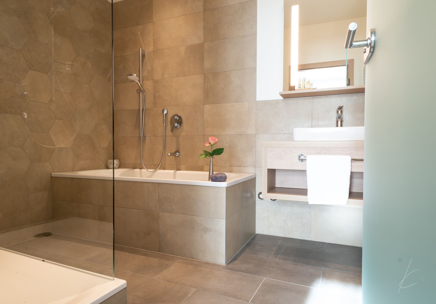 designer toiletries, hair dryer, towels