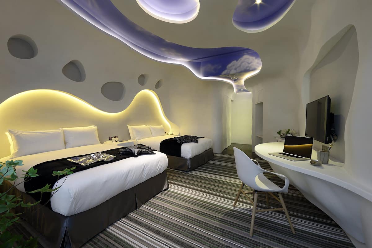 Standard Quadruple Room | In-room safe, individually decorated, individually furnished