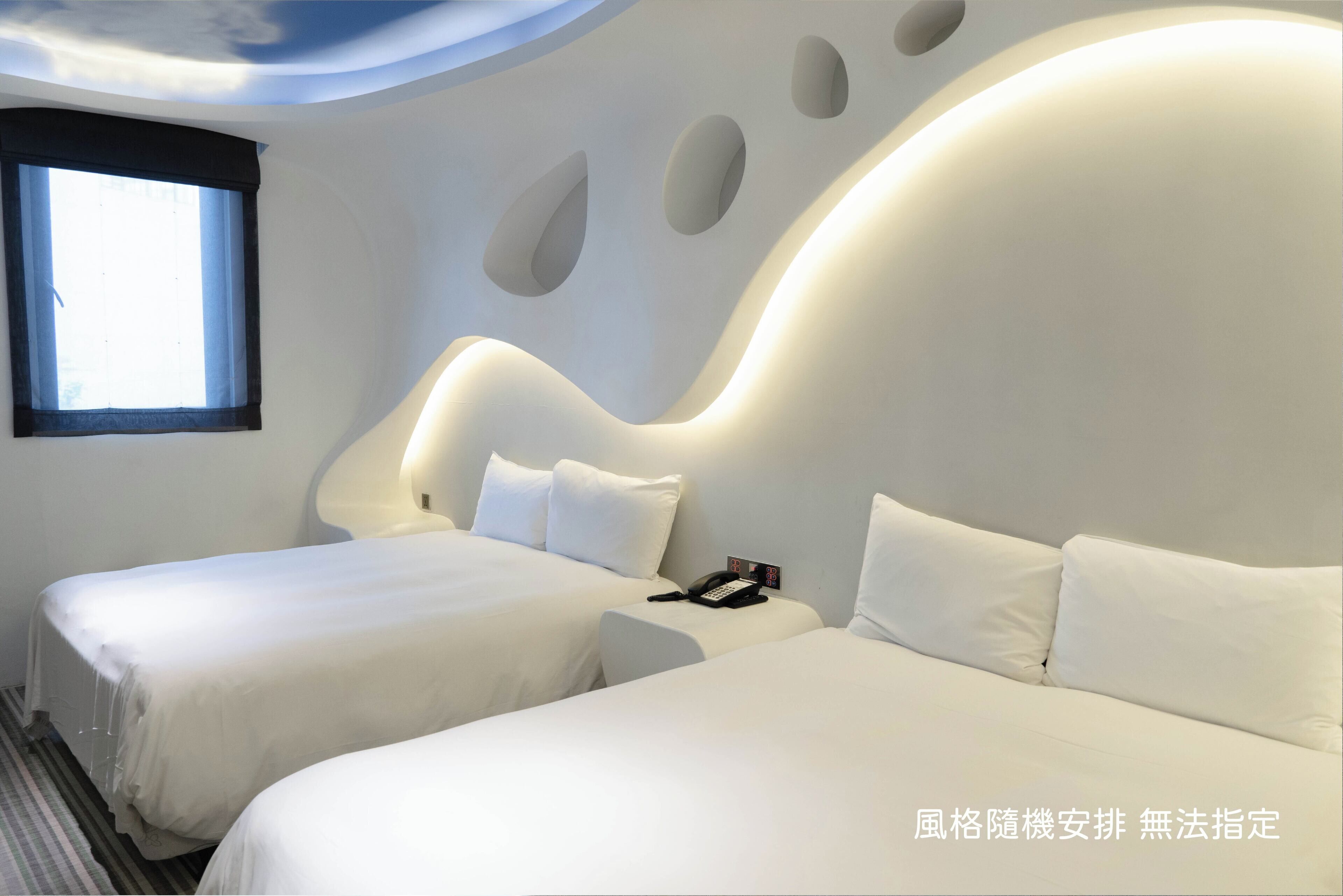 A modern hotel room with two beds, a window, and a unique ceiling design.