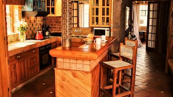 Family Apartment, 4 Bedrooms | Private kitchen | Microwave, electric kettle, toaster, eco-friendly cleaning products