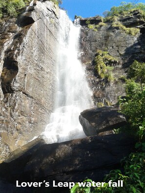 A waterfall cascading down a rocky cliff.