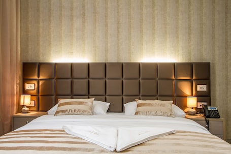 Down comforters, minibar, in-room safe, desk