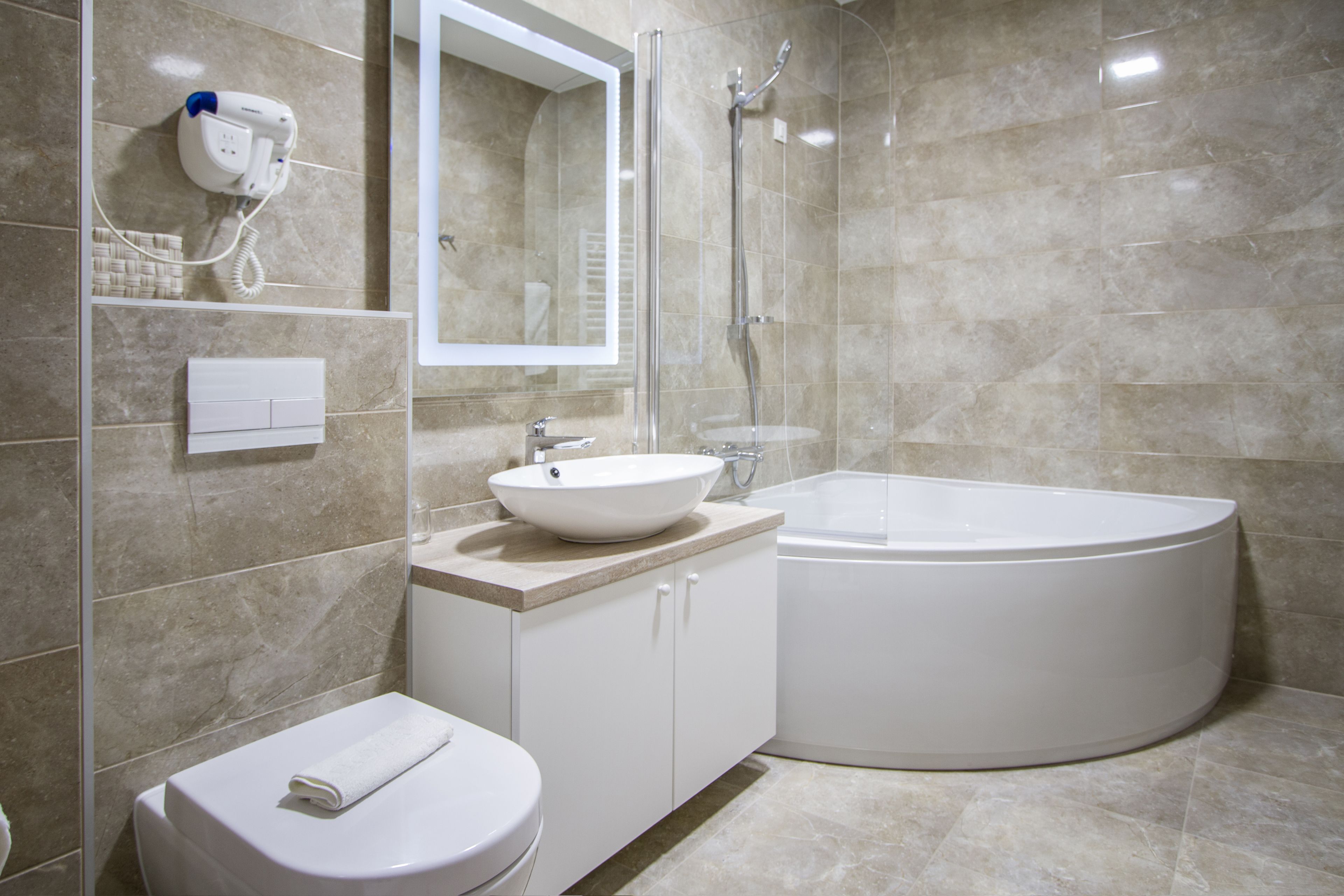 free toiletries, hair dryer, slippers, towels