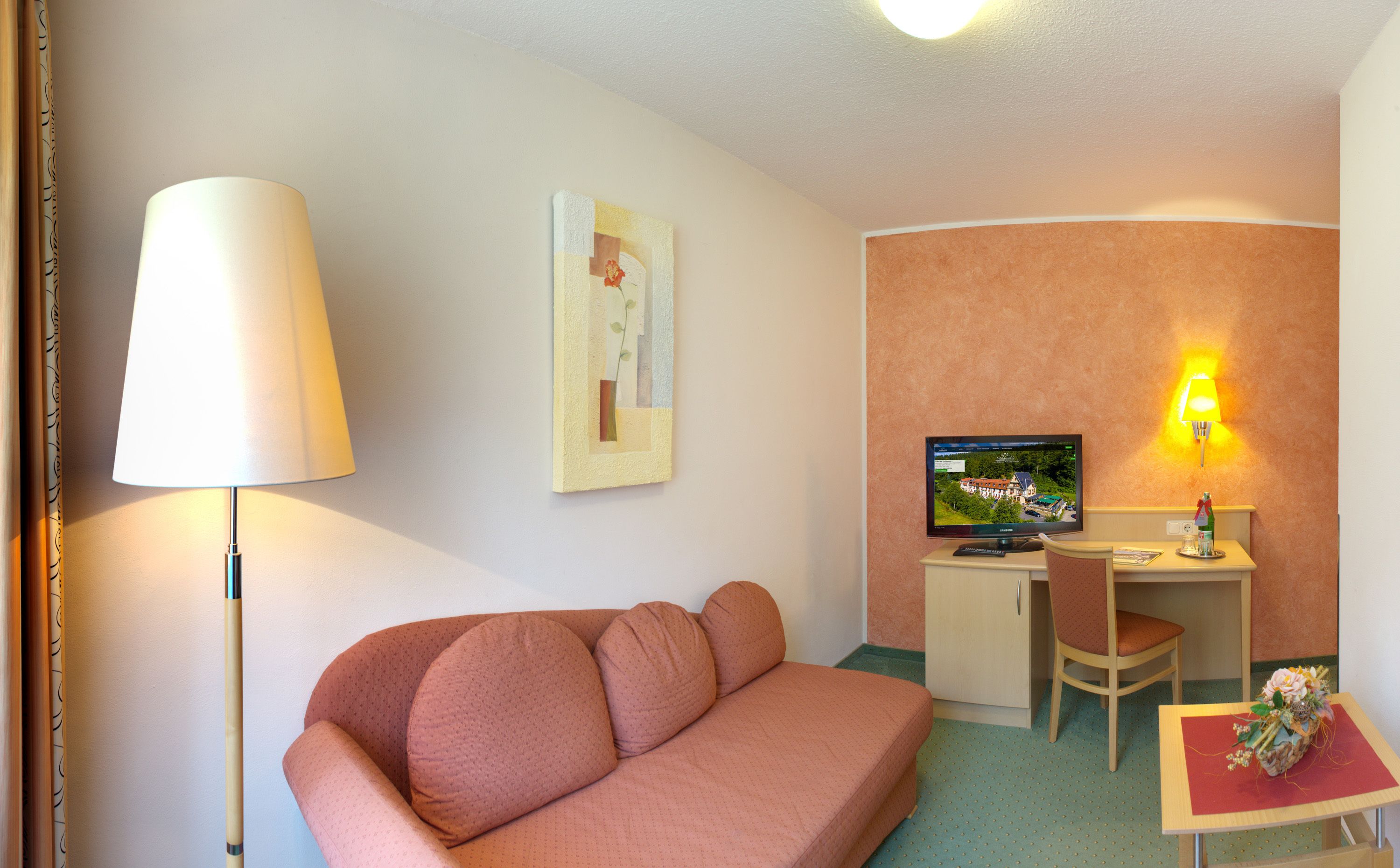 comfort double room | living area | flat-screen tv