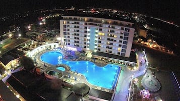 Indoor pool, seasonal outdoor pool, pool umbrellas, sun loungers