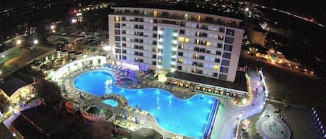 Indoor pool, seasonal outdoor pool, pool umbrellas, pool loungers
