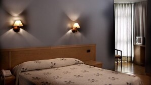 Escrivaninha, cortinas blackout, berços (sobretaxa), Wi-Fi de cortesia