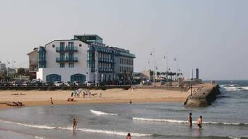 On the beach, white sand