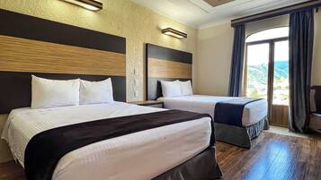 Desk, laptop workspace, free WiFi, bed sheets