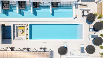 Seasonal outdoor pool, pool umbrellas, pool loungers