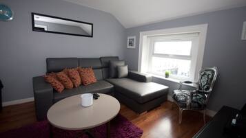 Apartment, 2 Bedrooms | Living area | Flat-screen TV