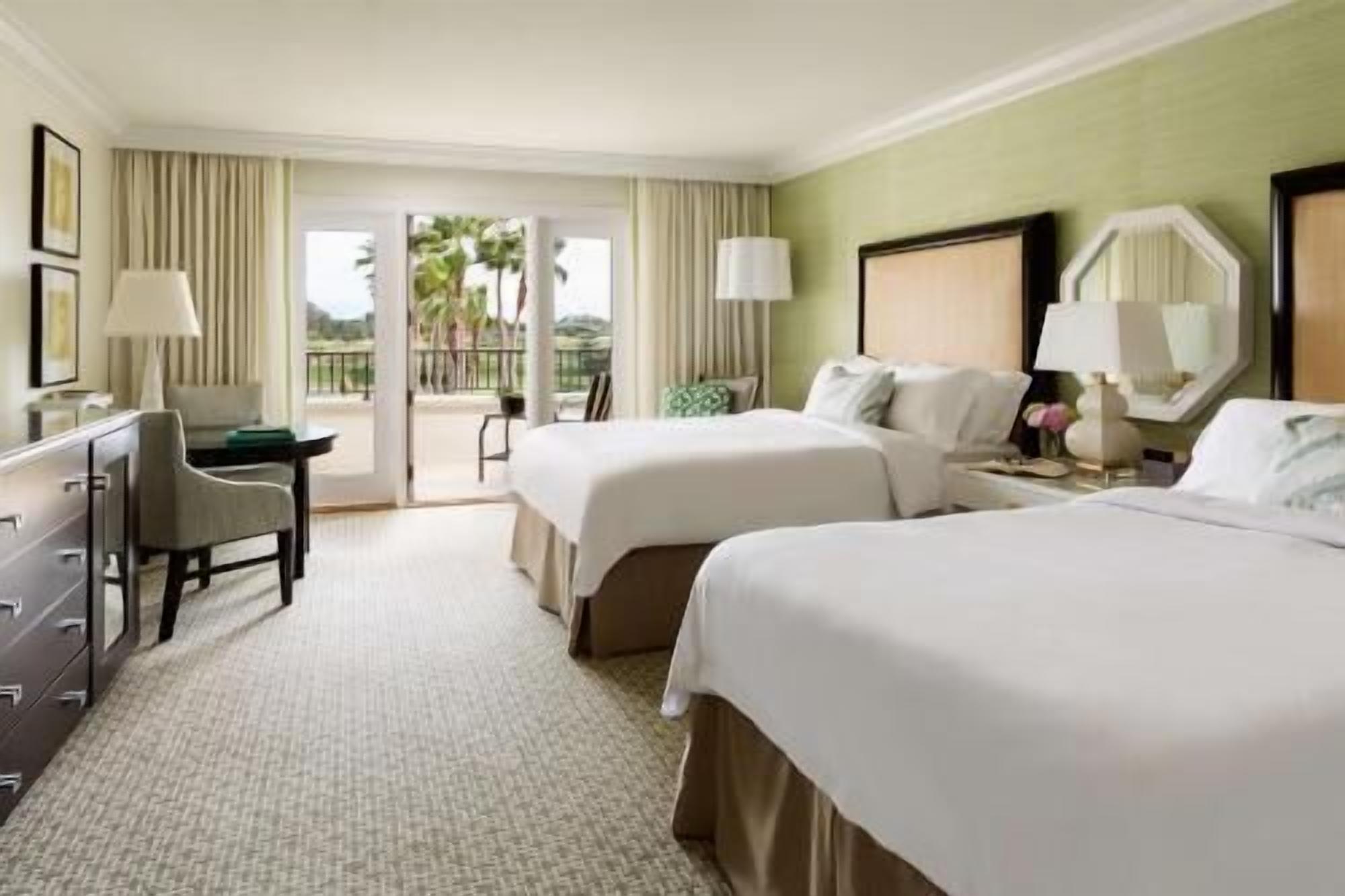 Premium bedding, down comforters, minibar, in-room safe