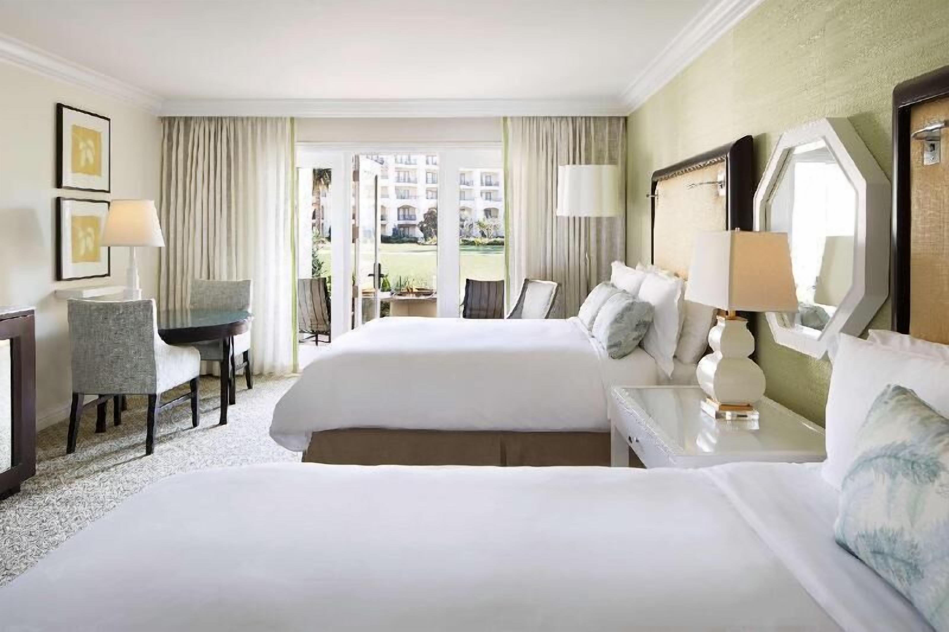 Premium bedding, down comforters, minibar, in-room safe