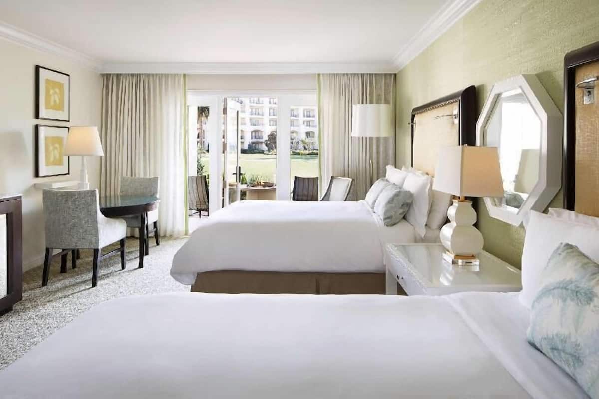 Premium bedding, down duvets, minibar, in-room safe