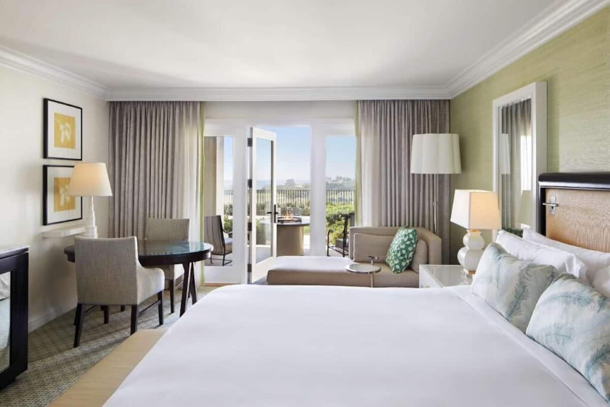 Premium bedding, down duvets, minibar, in-room safe