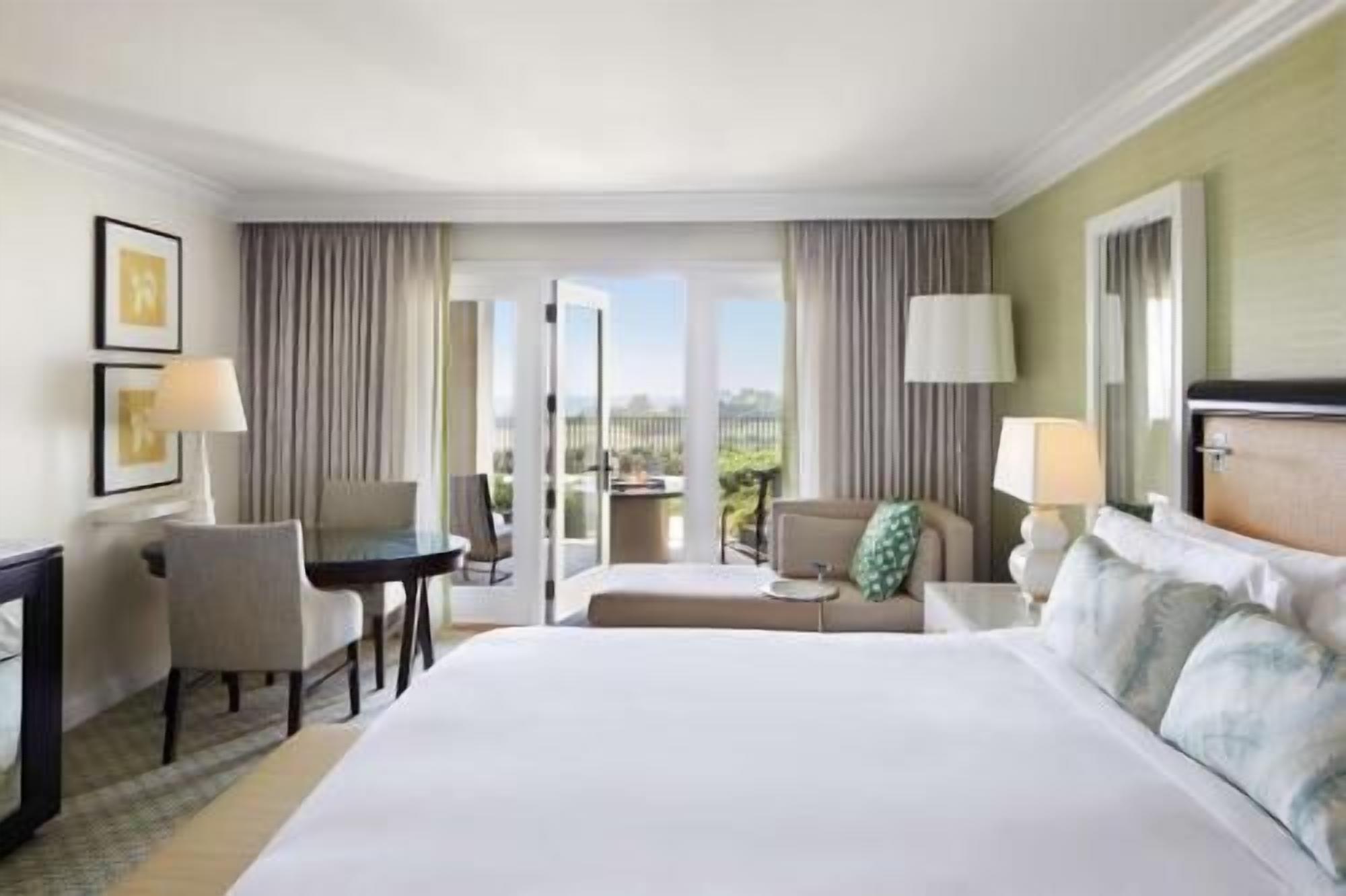 Premium bedding, down comforters, minibar, in-room safe