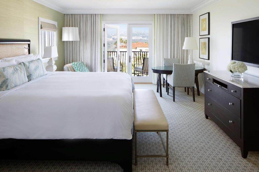 Premium bedding, down comforters, minibar, in-room safe