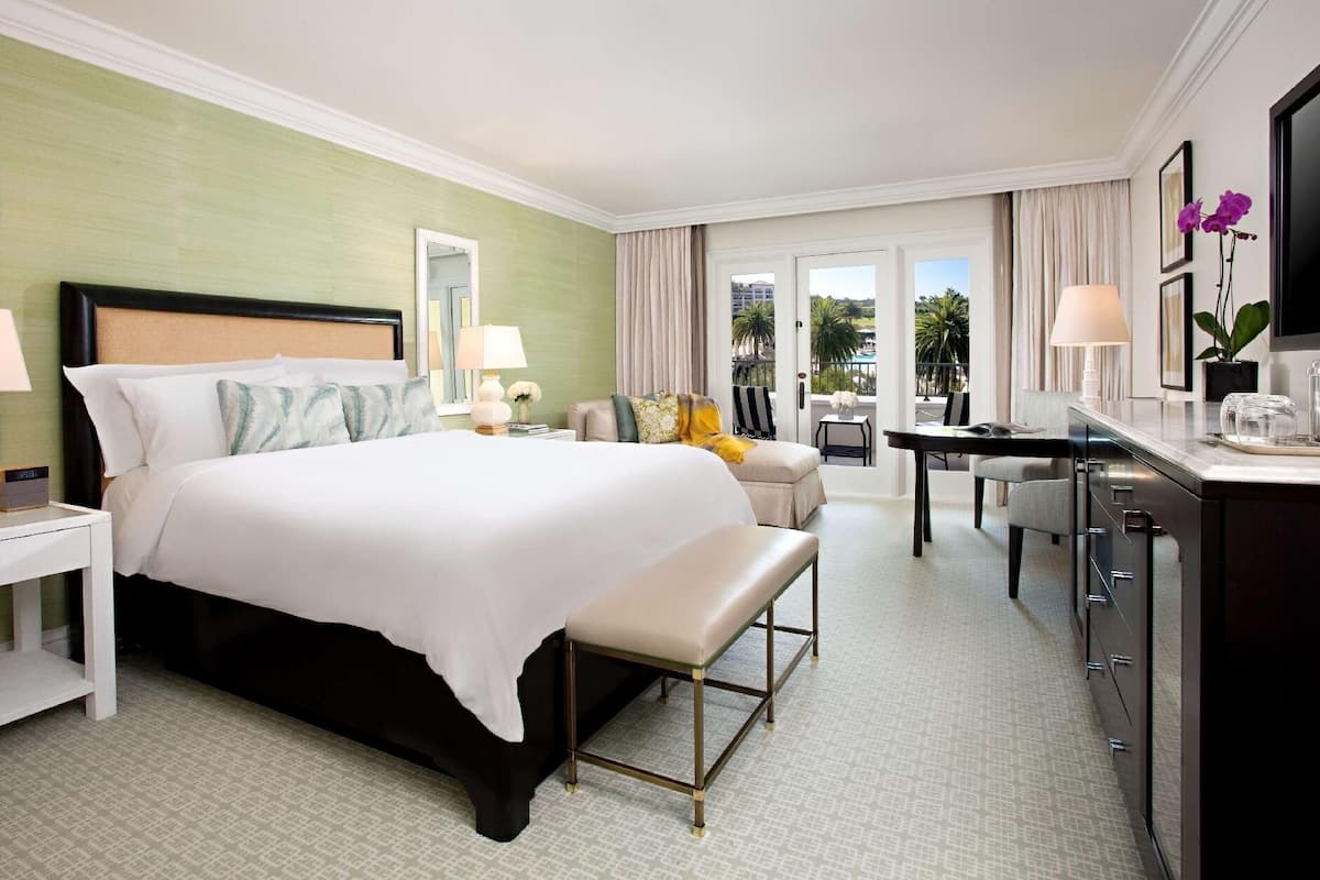 Premium bedding, down comforters, minibar, in-room safe