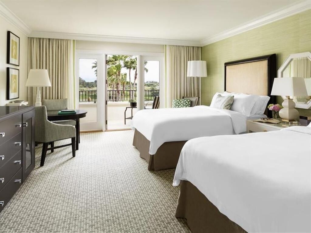 Premium bedding, down comforters, minibar, in-room safe