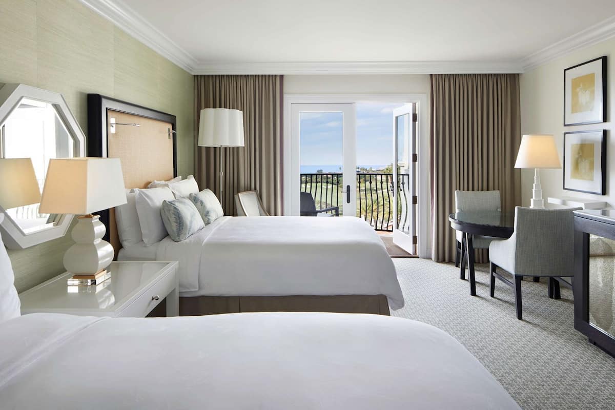 Premium bedding, down comforters, minibar, in-room safe