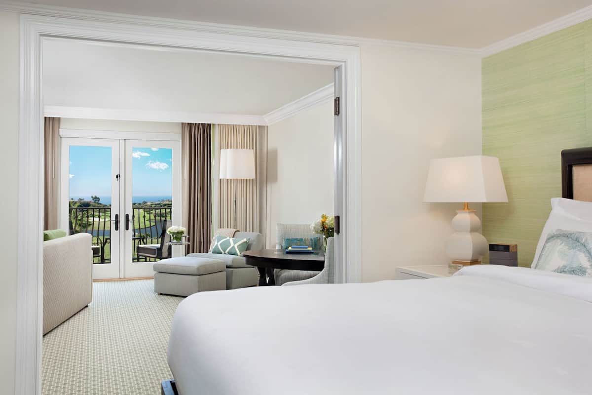 Premium bedding, down comforters, minibar, in-room safe