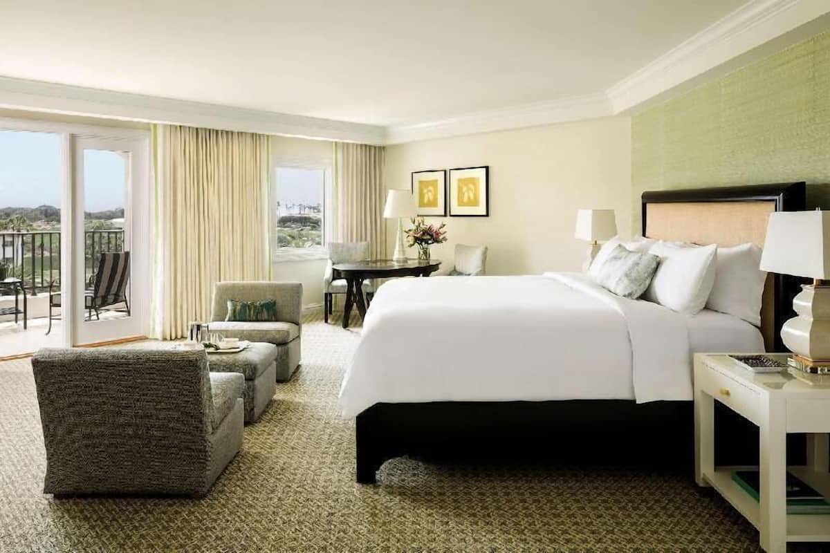 Premium bedding, down comforters, minibar, in-room safe