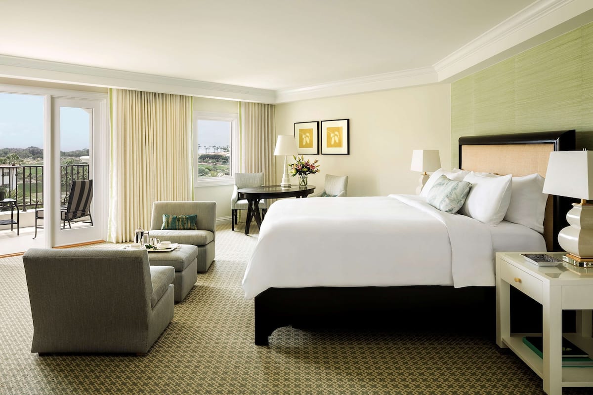 Premium bedding, down comforters, minibar, in-room safe