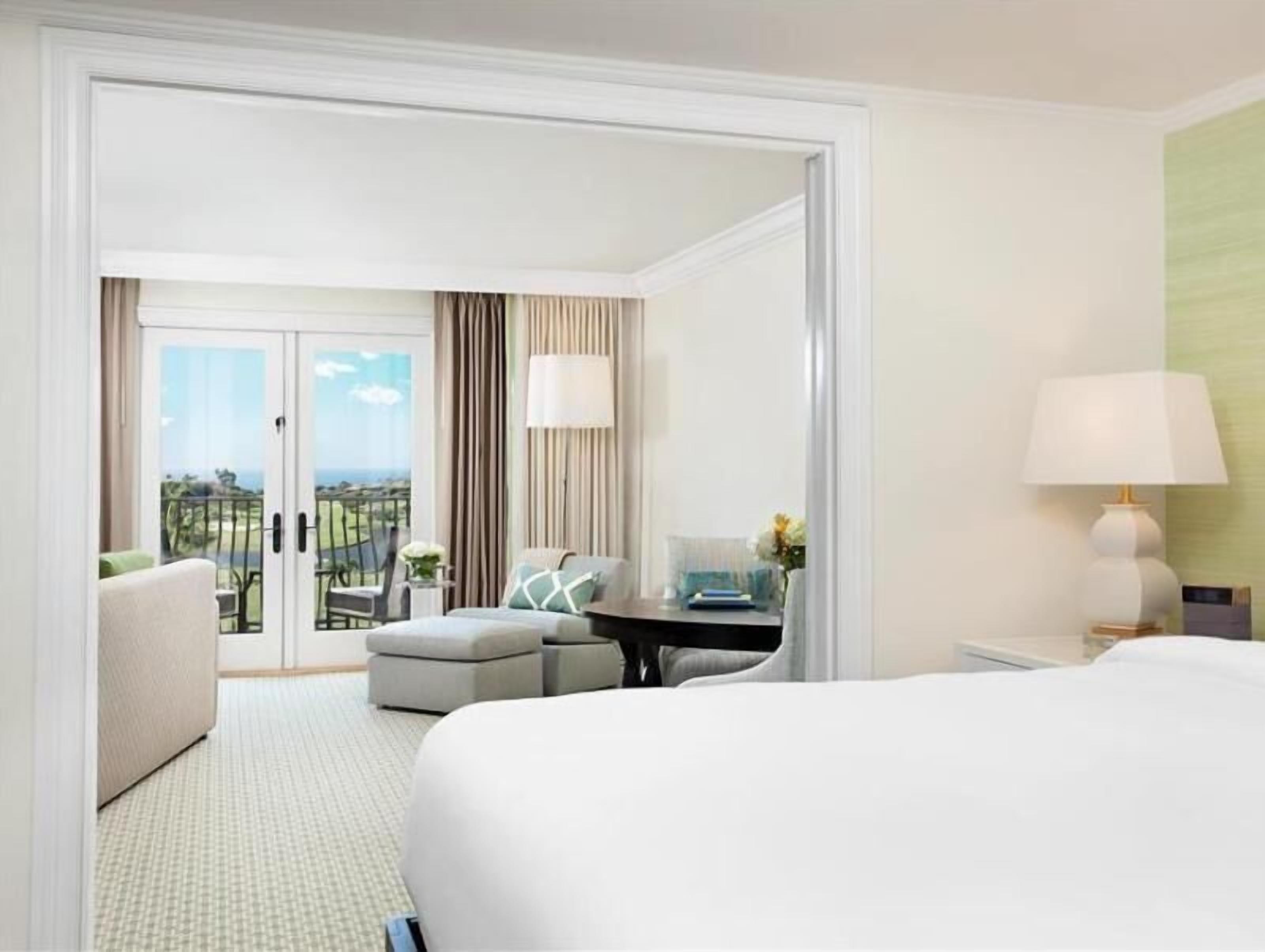 Premium bedding, down comforters, minibar, in-room safe