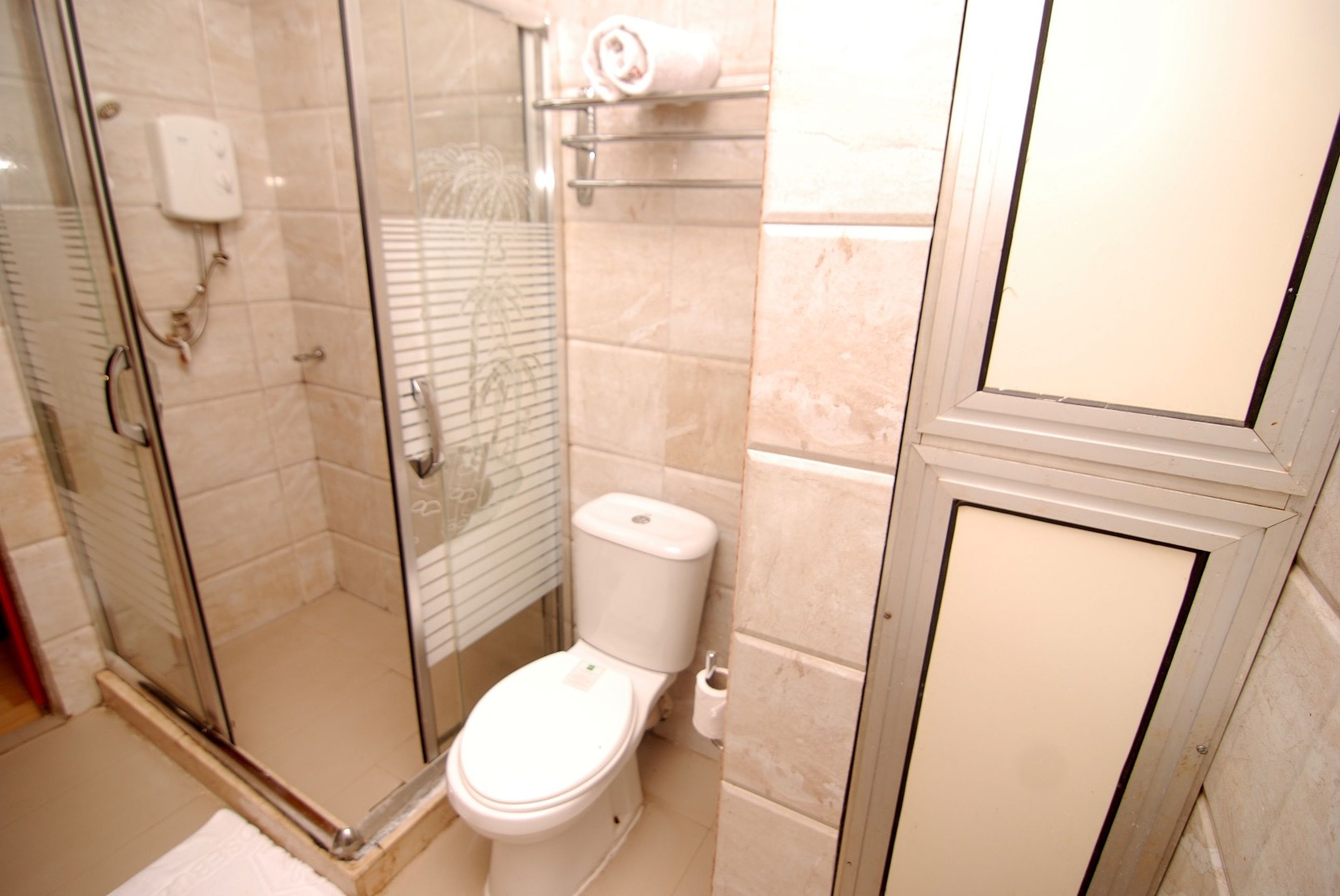 Shower, rainfall showerhead, towels
