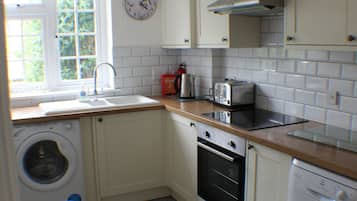 Cottage, 2 Bedrooms | Private kitchen | Full-size fridge, microwave, oven, dishwasher