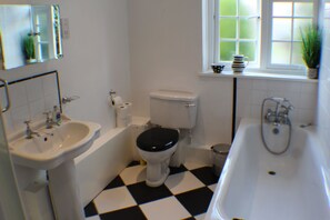 Cottage, 2 Bedrooms | Bathroom | Separate bathtub and shower, free toiletries, hair dryer, towels